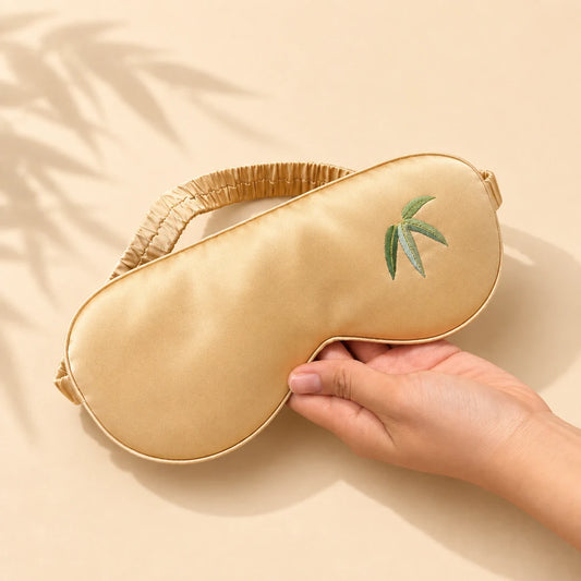 Champagne hand-embroidered mulberry silk sleep mask with bamboo-leaf motif