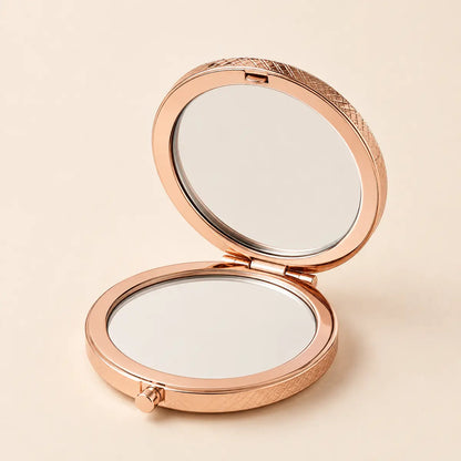 Open Green Bamboo compact mirror showing the double-sided mirrors