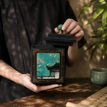 Hands opening a green crane bamboo charcoal canister for coffee bean storage