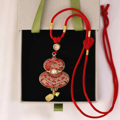 Red Song Brocade gourd pendant necklace presented in a gift box